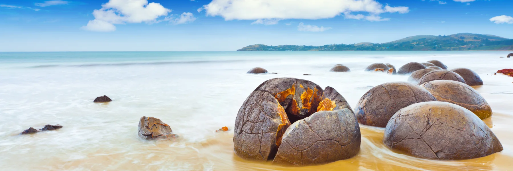 Witness the natural wonder of the Moeraki Boulders and explore the stunning landscapes of New Zealand with BoardingPass Tours